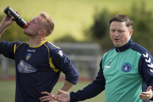 Carluke FC manager Paul Davies (right) branded some refereeing decisions in the 5-2 loss to Port Glasgow Celtic disgraceful