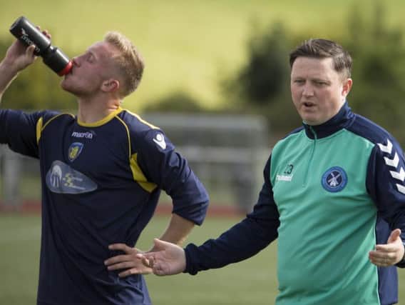 Carluke FC manager Paul Davies (right) branded some refereeing decisions in the 5-2 loss to Port Glasgow Celtic disgraceful