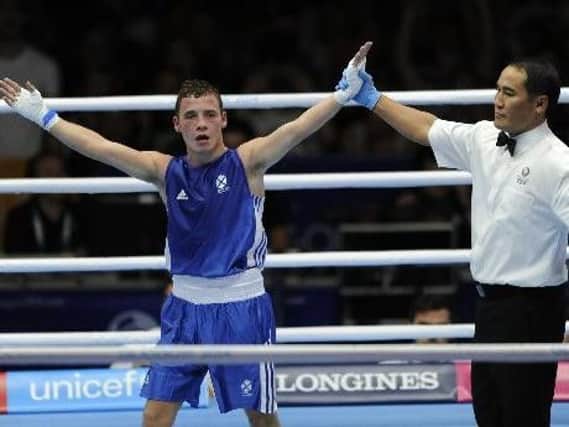 Reece McFadden celebrates his 52kg flyweight round of 16 win over Charlie Edwards at 2014 Commonwealth Games in Glasgow (Pic by Andrew OBrien)