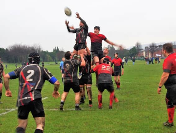 JJ McNair secures ball for Cumbernauld during their match at Clydebank (pic by Charlie Kearton)
