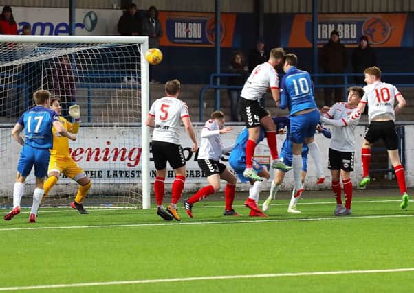 Chris Templeman of Montrose is denied by a stunning save from Blair Currie in the Clyde goal