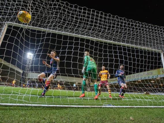 County defender Harry Souttar heads into his own net to put Motherwell in front (Pics by Ian McFadyen)