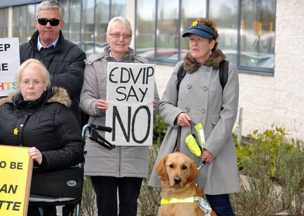 24-03-2015 Picture Roberto Cavieres.  Kirkintilloch. Protest outside Council HQ over Catherine Street junction. Councillors arriving for meeting to decide on plans for junction. Sandy Taylor Visually Impaired Forum