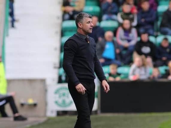 Motherwell manager Stephen Robinson looks on during his side's 2-2 draw against Hibs at Easter Road in September. 'Well return there tonight. (Pic by Ian McFadyen)