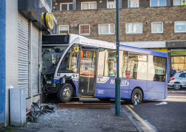 The bus plouged into the front of the tanning salon in Friday's crash