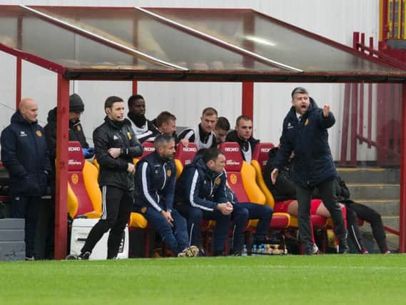 Motherwell manager Stephen Robinson roars on his troops during Saturday's draw against Partick Thistle (Pic by Ian McFadyen)