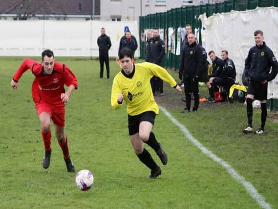 Richard Kane (right) in action for Bellshill Athletic against Carluke Rovers on Saturday (Pic by Brian Closs)