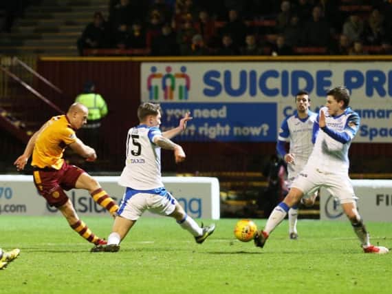 Curtis Main shoots home Motherwell's second goal in 2-0 home win over St Johnstone (Pic by Ian McFadyen)