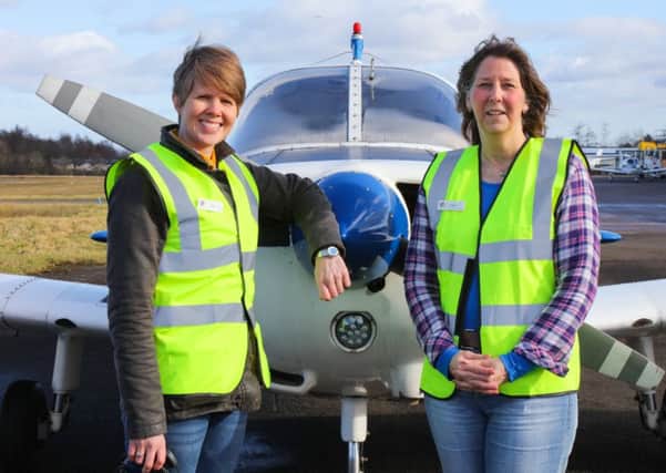 Border Air's new ground ops manager Connie McLeod (right) at Cumbernauld Airport with her colleague Lorna Ferguson who has learned to fly