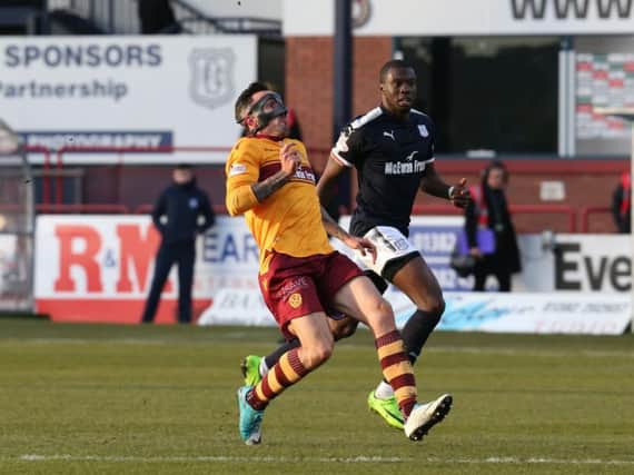 Motherwell striker Ryan Bowman gave the mask its second competitive outing in the 1-0 win at Dens Park on Saturday (Pic by Ian McFadyen)