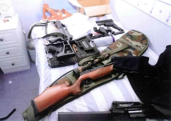 Firearms belonging to Dr Martin Watt found in his Condorrat home