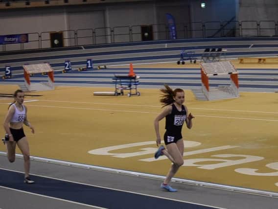 Katie Foss sprints towards the finishing line as she leaves rivals in her wake to clinch the Scottish Schools under-16 300m crown (Submitted pic)