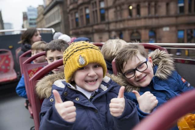 The images of the youngsters will be used in City Sightseeing Glasgow's marketing materials.