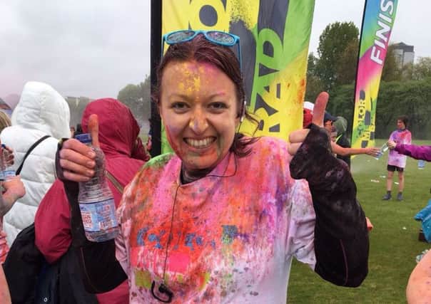 Eilidh pictured after running Colour Me Rad.