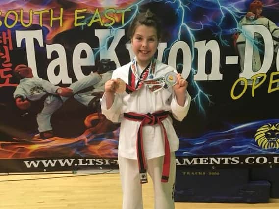 Aimee with her medal (Submitted pic)