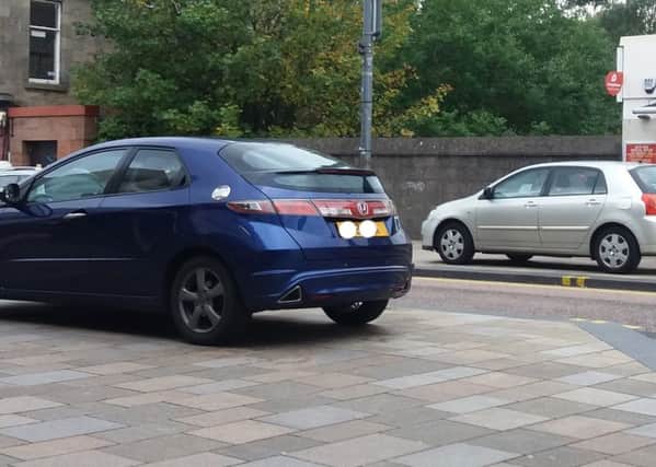 Cars parked illegally on Merry Street
