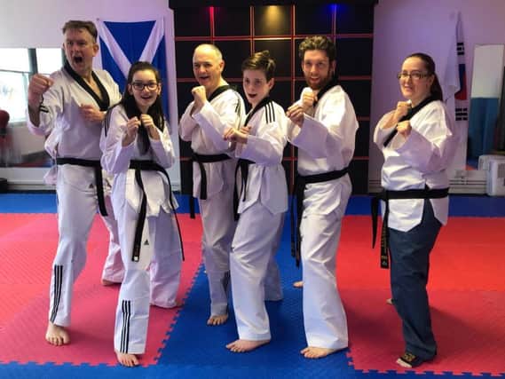 Members of the Dojang Martial Arts Tae Kwon Do Academy in Bishopbriggs celebrate their success