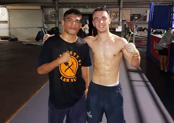 Nathaniel Collins with one of his sparring partners in Australia as he prepares for the Commonwealth Games with Team Scotland