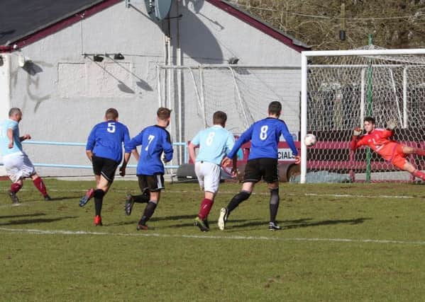 Robbie Winters fires home Cumbernauld's first goal from the penalty spot (pic by Eoin Sinclair)