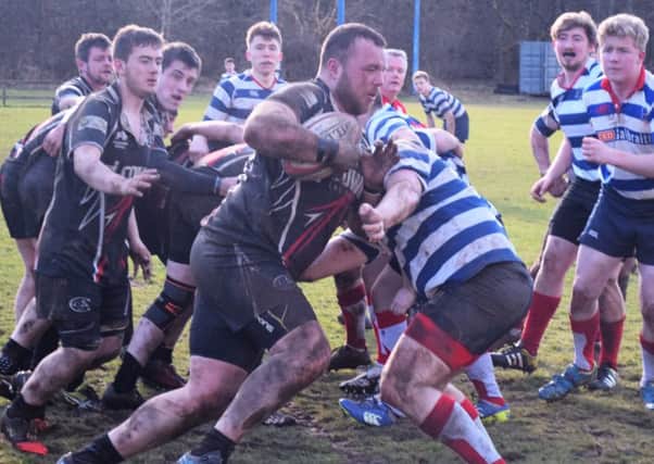 Cumbernauld man of the match Ian Hepburn takes the game to Strathendrick (pic by Charlie Kearton)