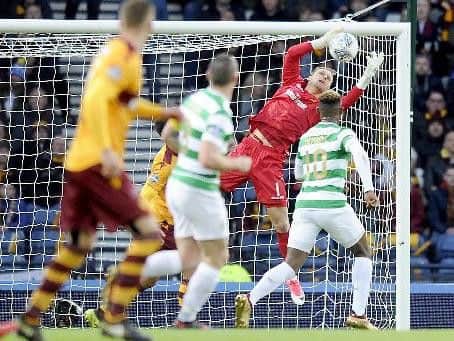 Trevor Carson makes a save in the Betfred Cup final against Celtic (Pic by Michael Gillen)