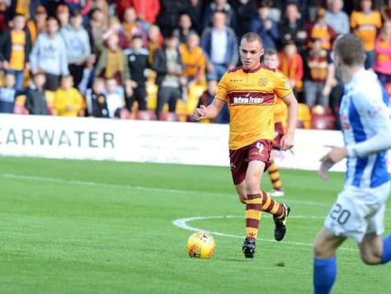 Liam Grimshaw is pictured playing against Kilmarnock earlier this season
