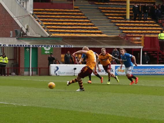 Curtis Main strikes home an early penalty to put Motherwell 1-0 up against Rangers (Pic by Ian McFadyen)