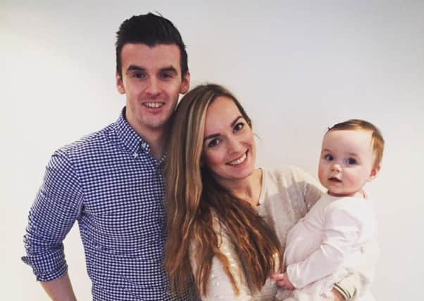 Chris pictured with his wife Lauren and baby daughter Darcey.