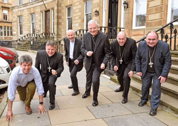 SCIAF Director Alistair Dutton limbers up for the fun run with (l-r) Bishop of Paisley John Keenan, Bishop of Galloway William Nolan, Archbishop of St Andrews and Edinburgh Leo Cushley, Bishop of Argyll and the Isles Brian McGee, and SCIAF Bishop President Bishop of Motherwell Joseph Toal