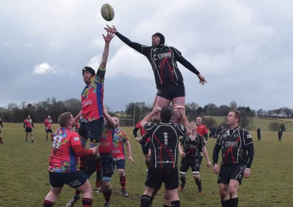 Cumbernauld's Chris Birney wins the ball at a lineout (pic by Charlie Kearton)