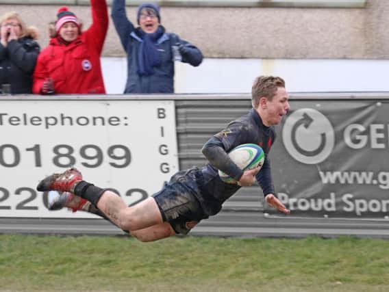 Colts youngster Luhann Kutze scores in Biggar Rugby Club 1st XVs 13-10 home league loss to Kirkcaldy on Saturday (Pic by Nigel Pacey)