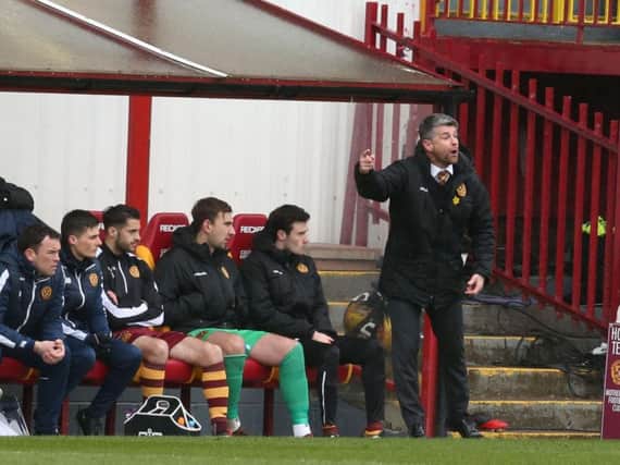 Motherwell manager Stephen Robinson encourages his troops during Saturday's 2-2 draw against Rangers (Pic by Ian McFadyen)