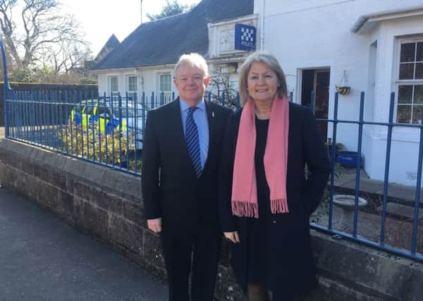 Councillor Kenny McCreary and Margaret Mitchell MSP outside Uddingston Police Station
