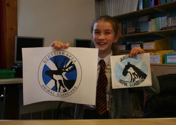 Enya Ruddy, from Croy, winner of the Scottish SPCA's Animal Guardians logo competition.