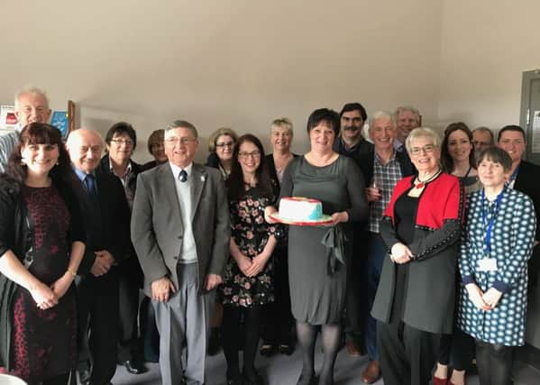Birthday celebrations...were held on Thursday and Friday to celebrate the Haven's first year at 36 Manse Road, Forth. The funders and board members are pictured here celebrating the milestone with founder Dr Rosalie Dunn (front row, second from right).