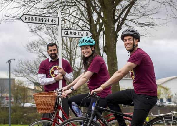 Transport Minister Humza Yousaf is joined by STV presenter Jennifer Reoch and the Capital Radios Des Clarke to launch Pedal for Scotlands 20th Glasgow to Edinburgh ride, which will take place on Sunday, September 9. (Photo: Â© Craig Watson)