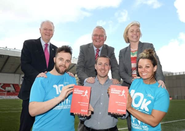 Members of North Lanarkshire Council and the NL Leisure team celebrate the award.