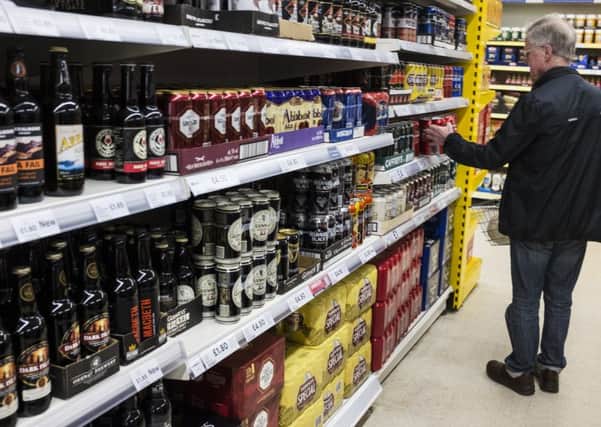 A minimum of 50p per unit is now being added to the price of alcohol. Photo: John Devlin
