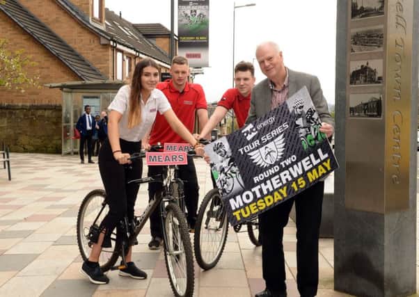 Mears apprentices Lucy Vaughan, Ryan McGoldrick and Aidan Caldow with Councillor Allan Graham as they promote the OVO Energy Tour Series coming to Motherwell