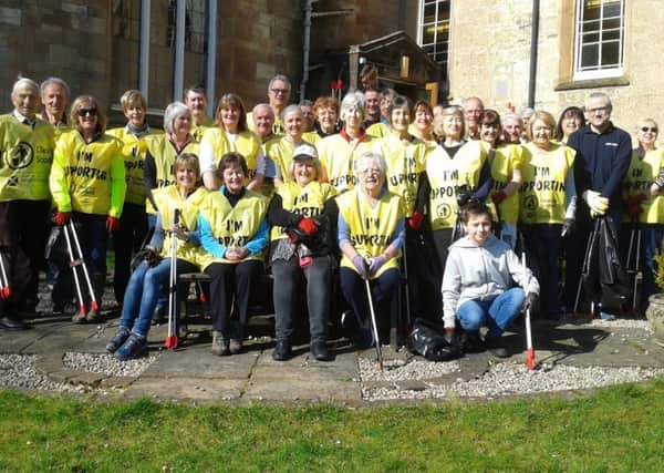 Members of Busby Parish Church and the local community took part in the clean up of their area.