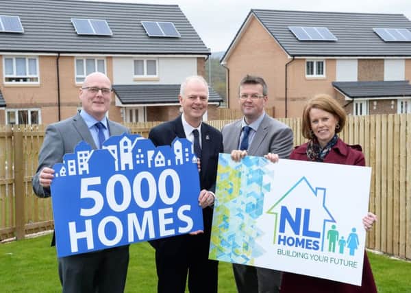 Councillor Allan Graham (second, left) was joined by North Lanarkshire Council's head of housing solutions Stephen Llewellyn ,assistant chief executive - enterprise and housing resources Des Murray and housing development manager Pamela Humphries as he outlined the councils ambitious plans to more than double its new council homes to 5000.