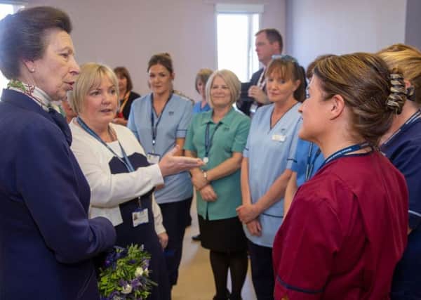 University Hospital Wishaws chief midwife  Lyn Clyde introduces Princess Anne to staff during the royal visit to the maternity unit