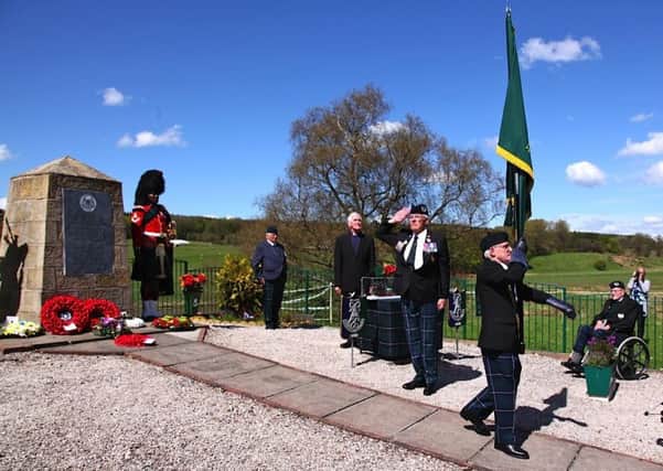 Former members of the regiment and their families gathered for the ceremony near Douglas.