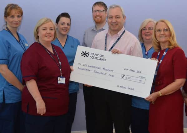 Pictured from left are midwife Jane Hunter, chief midwife Lyn Clyde, midwife Vicky Grove, Sands network co-ordinator Chris Somerville, Glasgow Sands befriender Gavin Moir, midwife Veronica Winters, bereavement specialist midwife/counsellor Elaine Hamilton and senior midwife Amanda Kennett.