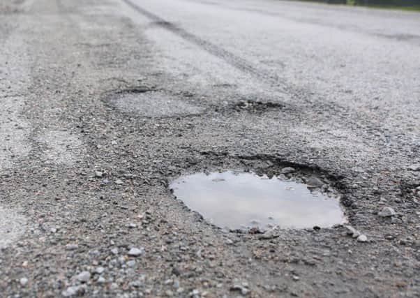 Pot holes are costing motorists and insurance companies around Â£1million per week.