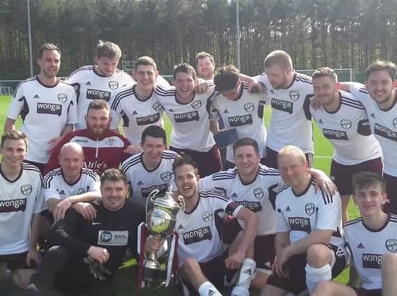 Jubilant Carluke Hearts players celebrate their Miller Cup triumph in Edinburgh (Submitted pic)