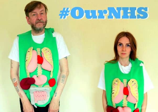 Duglas T Stewart and Chloe Philip from BMX Bandits show their support for the NHS