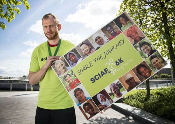 Football ace Mark Reynolds wants Scots to sign up for SCIAFs 6k Family Fun Run on June 2 at Strathclyde Parkl to kick-start a new healthy lifestyle. Pic - Paul Chappells