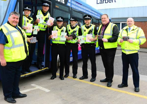 Officers with First Bus staff raise awareness of doorstep crime as part of Police Scotlands Operation Monarda. Advice was given out to bus passengers during the exercise.