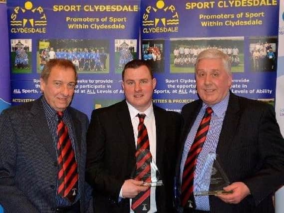 Jamie McKenzie (centre) with Forth committee men Dougie McKendrick (left) and Stuart Smith. The clubs 2016 league title win was marked by Coach of the Year and Team of the Years prizes being awarded to them at last years Clydesdale Sports Council Sports Personality of the Year Awards.